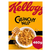 Front of a Kellogg's - Crunchy Nut Cereal - 460g box, featuring a bowl of cereal, honey dipper, scattered nuts, and highlighting natural grains and added Vitamin D.